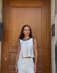 Top bianco con profili neri – Le Streghe