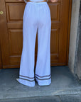 Pantalone palazzo bianco con dettagli a contrasto – Le Streghe