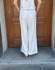 Pantalone palazzo bianco con profili neri – Le Streghe